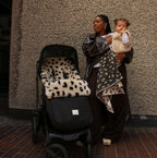 Footmuff Puffmuff® - Merino Sheepskin - Noir + Leopard - BINIBAMBA