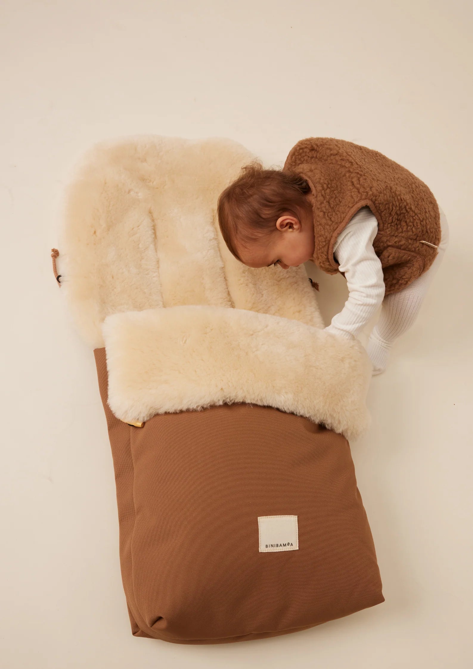 Fußsack Puffmuff® - Merino-Lammfell - Bruno + Milk - BINIBAMBA