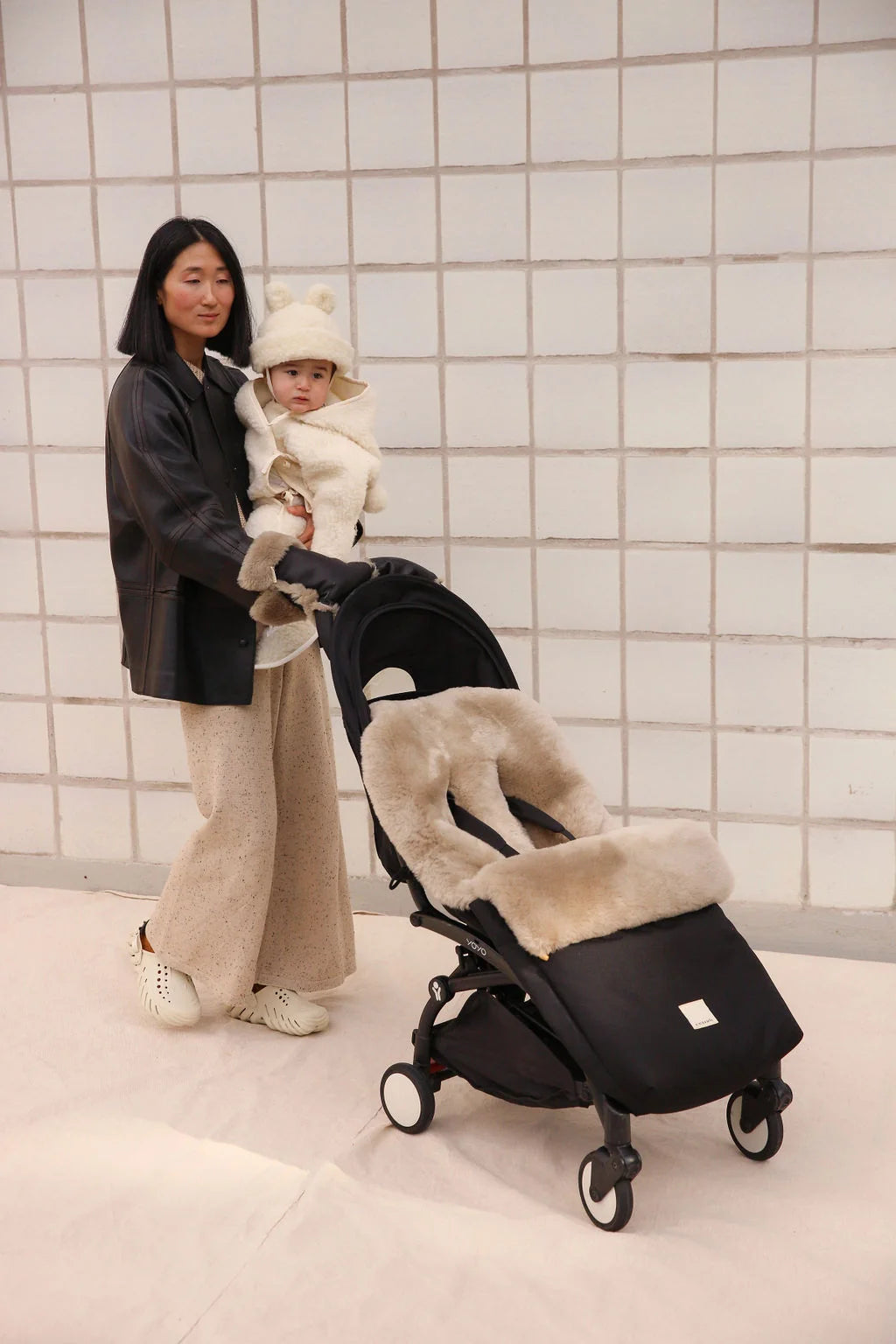 Toast Puffmuff – Luxe kinderwagenvoetenzak van merino schapenvacht – BINIBAMBA