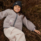 Kinder muts Omalas - Merino wol - Charcoal melange/grijs - Wheat meisje